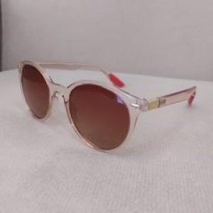 OCULOS REDONDO COM DETALHES NA ARMAÇAO