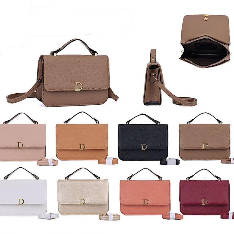 BOLSA PEQUENA QUADRADA DETALHE COM A LETRA D