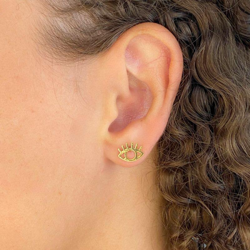 BRINCO PEQUENO LISO OLHO GREGO COM CILIOS