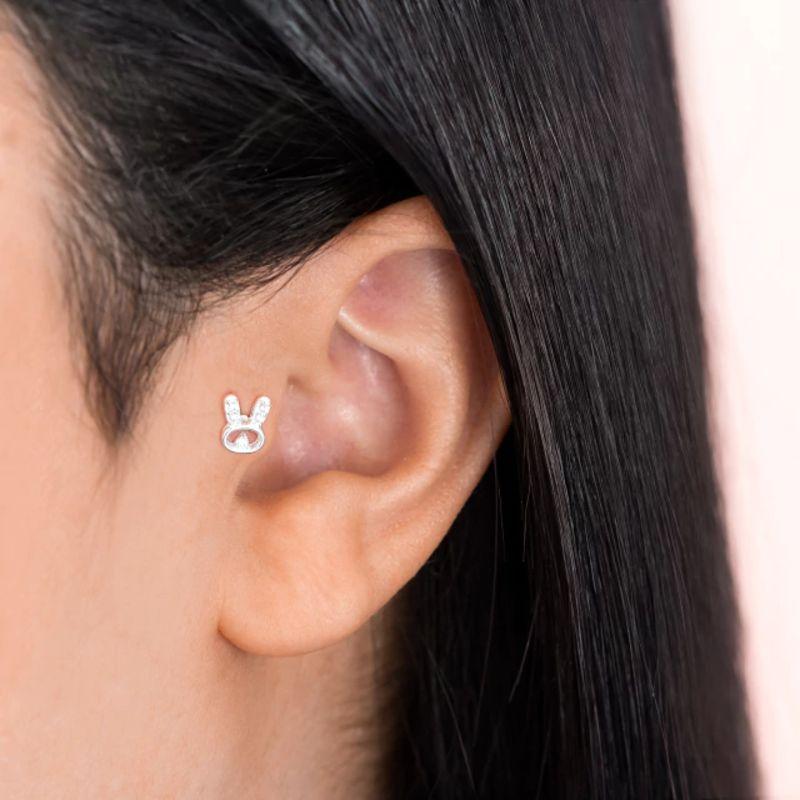 PIERCING P925, E O PINO E TARRACHA EM AÇO CIRURGICO P/ TRAGUS E HÉLICE COELHO CRAVEJADO CRISTAL 7MM