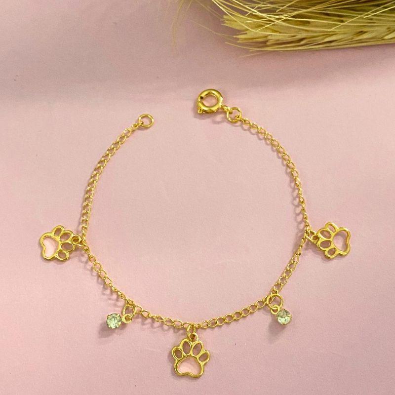 PULSEIRA INFANTIL COM 3 PATAS DE CACHORRO E COM 2 PONTO DE LUZ